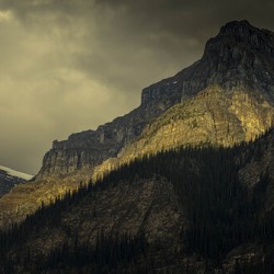 Sunset Casting A Glow on Mountain Peak In Lake Louise Alberta Canada